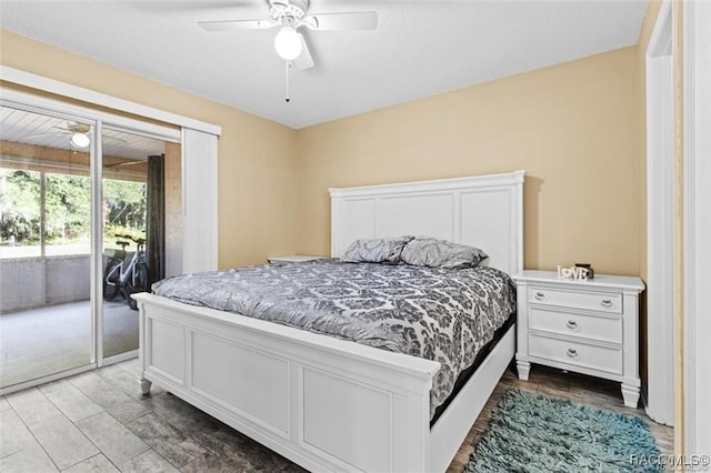 bedroom with access to exterior and ceiling fan