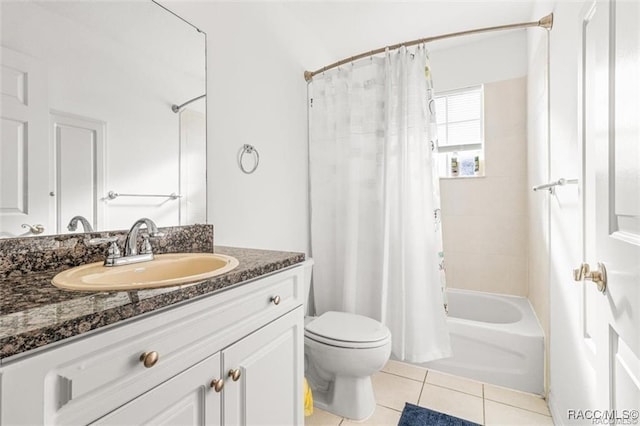 full bathroom featuring tile patterned floors, toilet, shower / tub combo, and vanity