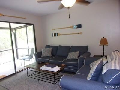 living room with ceiling fan