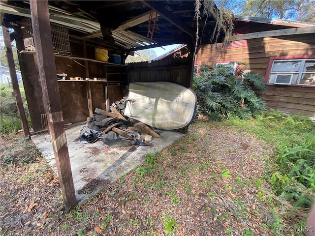 view of yard featuring an exterior structure and an outbuilding