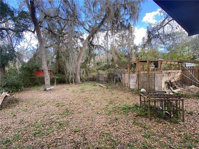 view of yard with fence