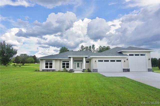 786 E Dunbar Ln, Hernando, FL 34442 - prairie-style house with an attached garage, a front yard, stone siding, concrete driveway, and stucco siding