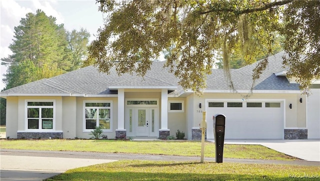 786 E Dunbar Ln, Hernando, FL 34442 - view of front facade featuring stone siding, concrete driveway, and roof with shingles