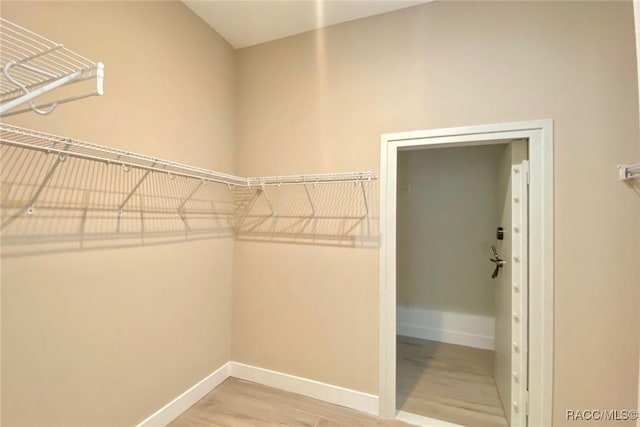786 E Dunbar Ln, Hernando, FL 34442 - walk in closet featuring wood finished floors