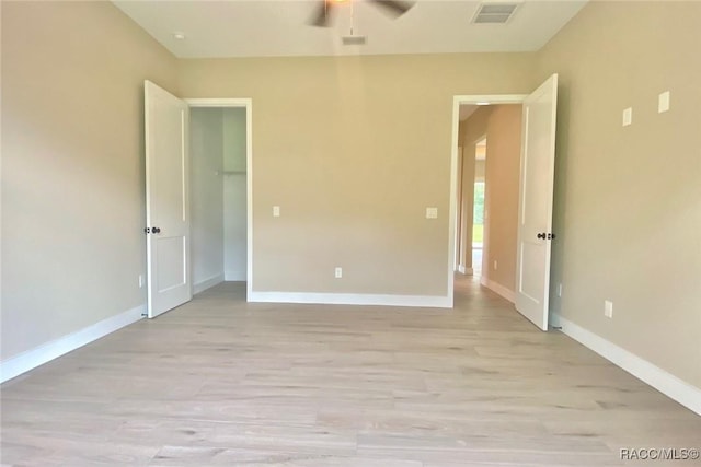 786 E Dunbar Ln, Hernando, FL 34442 - unfurnished bedroom with light wood-style flooring and a ceiling fan