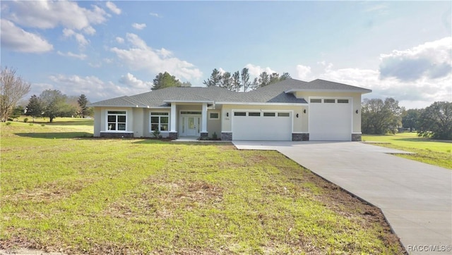 view of front of house with a front lawn, concrete driveway, stucco siding, a garage, and stone siding