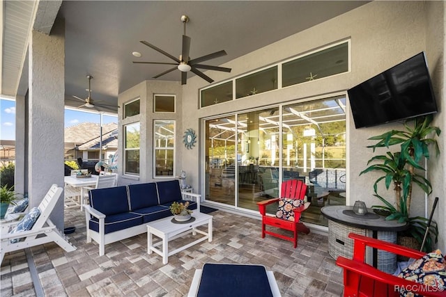 view of patio featuring outdoor lounge area and ceiling fan