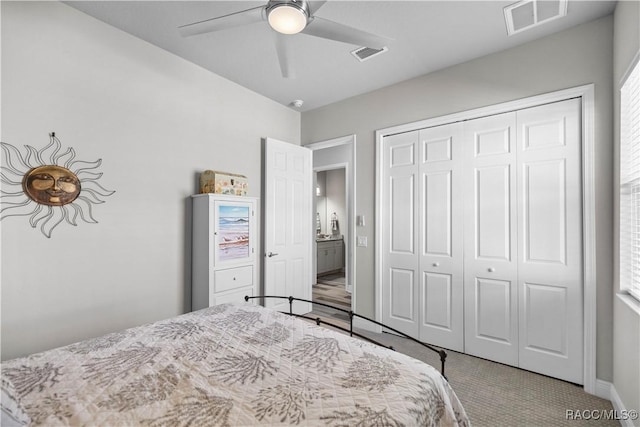 bedroom featuring carpet, a closet, and ceiling fan