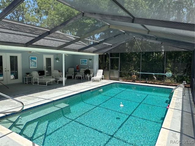 833 N Lafayette Way, Inverness, FL 34453 - swimming pool featuring french doors, a patio area, a lanai, and a ceiling fan