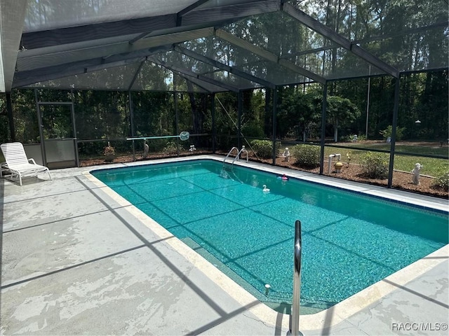 833 N Lafayette Way, Inverness, FL 34453 - swimming pool with glass enclosure and a patio