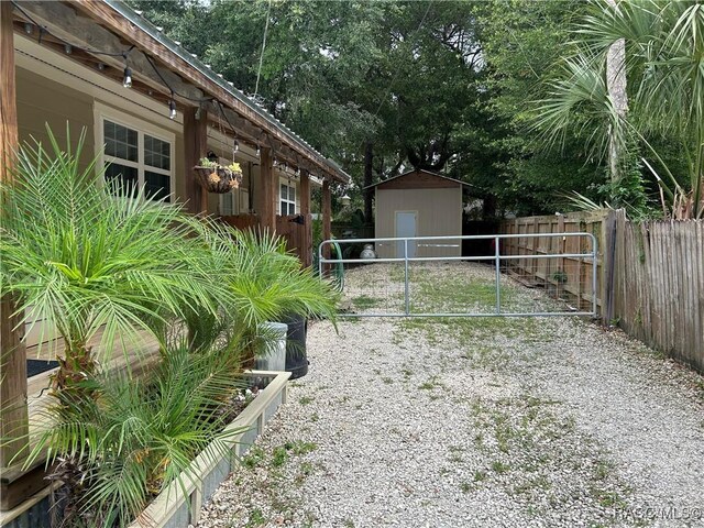 18 56th St, Yankeetown, FL 34498 - view of yard with a storage shed