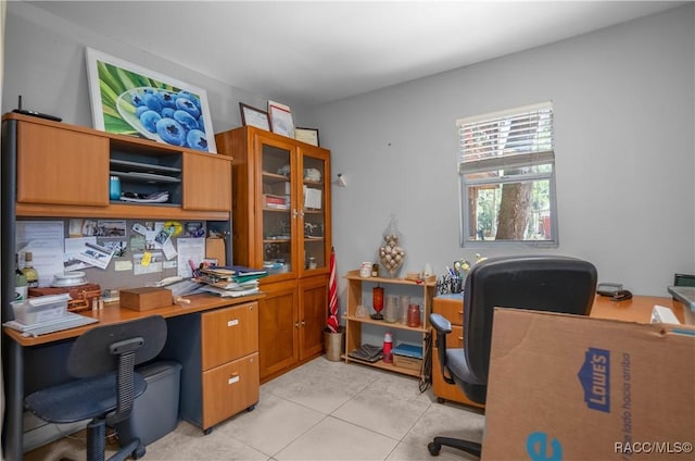 office with light tile patterned floors