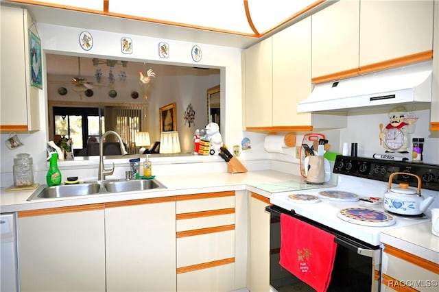 kitchen featuring white cabinets, white electric range oven, dishwasher, and sink