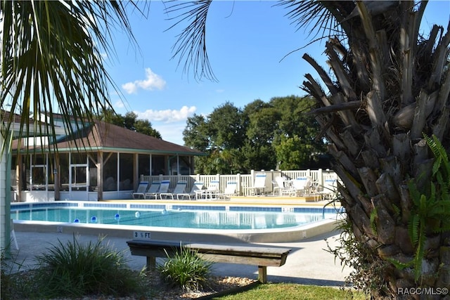 view of swimming pool with a patio