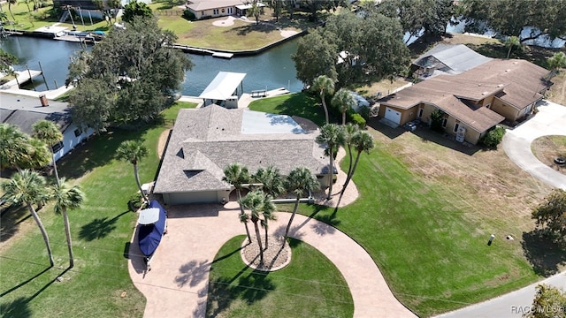 birds eye view of property featuring a water view