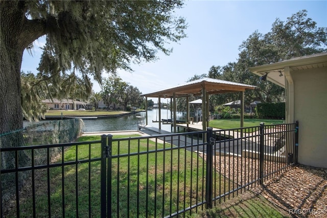 exterior space featuring a yard and a water view