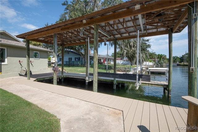 dock area with a water view