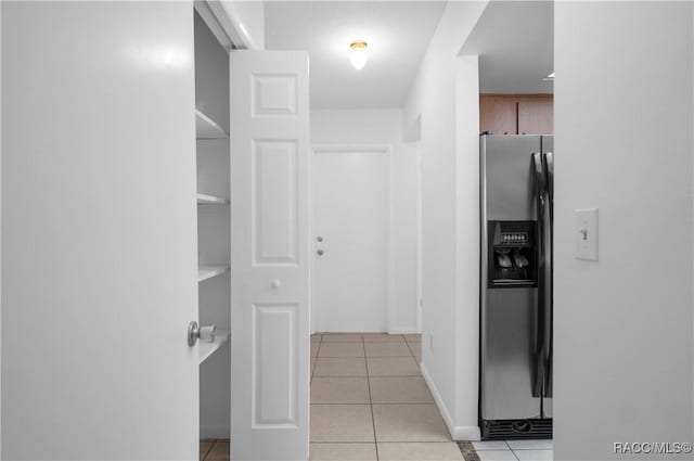 interior space with light tile patterned floors