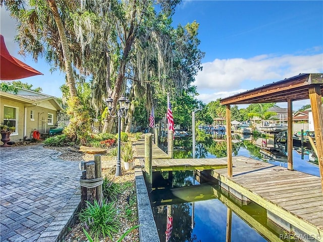 view of dock with a water view