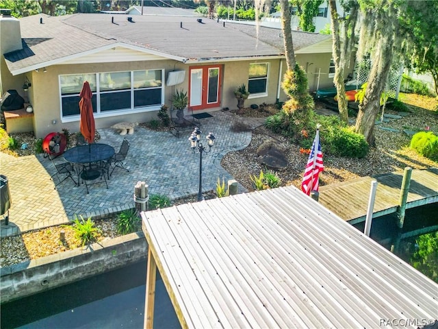 rear view of property with a patio