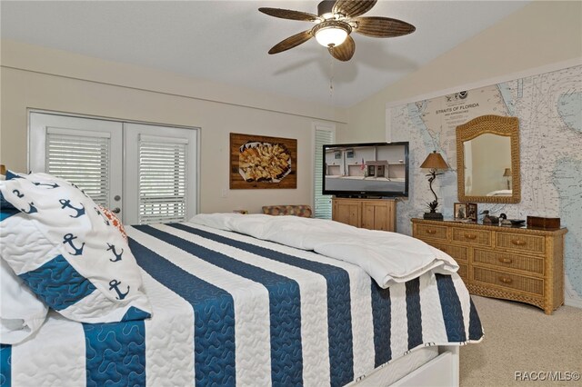 bedroom with access to exterior, carpet flooring, vaulted ceiling, and ceiling fan