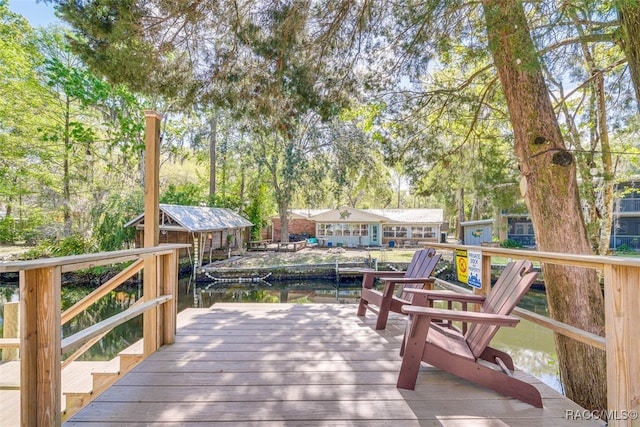 wooden deck with a water view