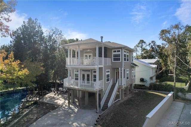 view of front of property with a balcony