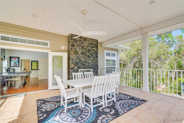 sunroom / solarium with wood ceiling