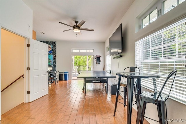 dining room featuring ceiling fan, plenty of natural light, and light hardwood / wood-style flooring