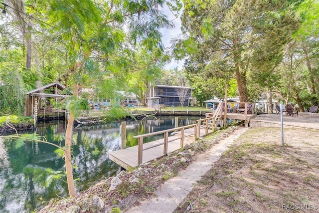 view of dock with a water view