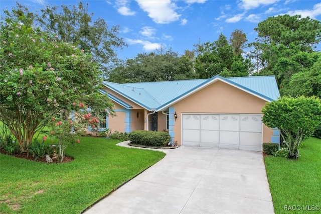 ranch-style house with a garage and a front lawn