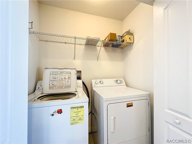 laundry area featuring independent washer and dryer