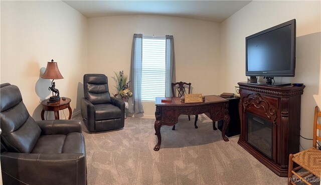 carpeted home office with baseboards