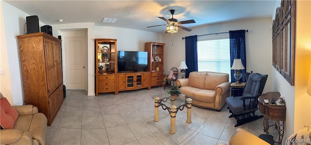 living room featuring ceiling fan, light tile patterned flooring, and visible vents