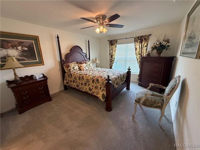 bedroom with baseboards, carpet, and ceiling fan