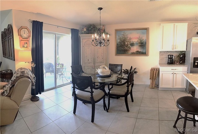 dining area featuring radiator, baseboards, a notable chandelier, and light tile patterned floors
