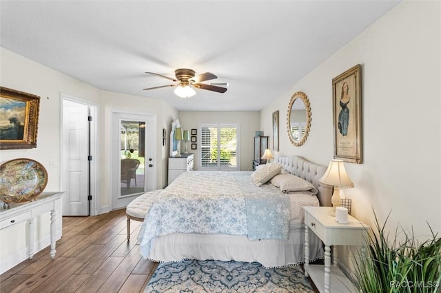 bedroom featuring access to outside and ceiling fan