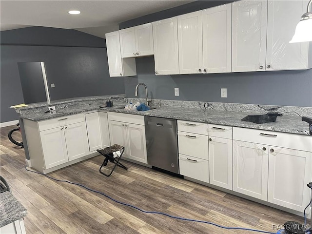 kitchen featuring white cabinets, light hardwood / wood-style flooring, sink, and dishwasher