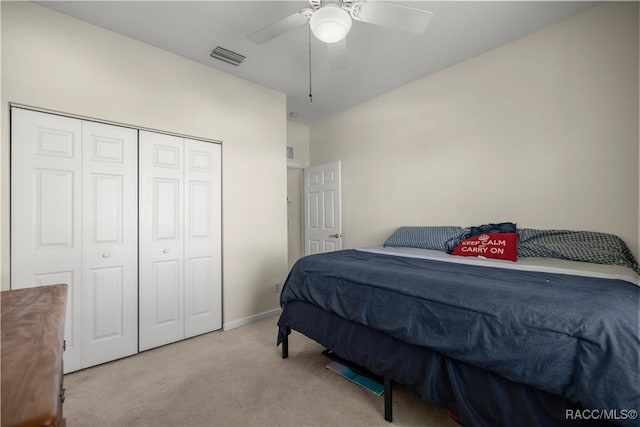 2083 NW 57th Ct, Ocala, FL 34482 - carpeted bedroom featuring visible vents, baseboards, ceiling fan, and a closet