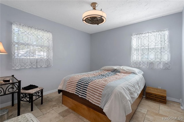 bedroom with baseboards