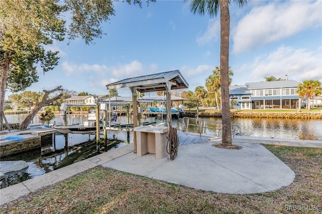 view of dock with a water view and boat lift