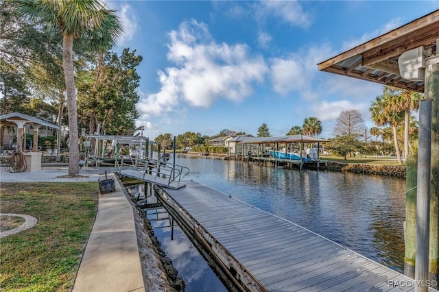 dock area featuring a water view and boat lift