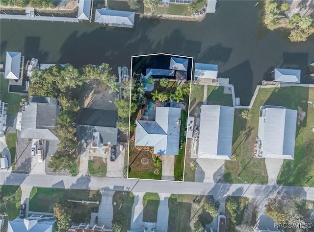 birds eye view of property with a residential view