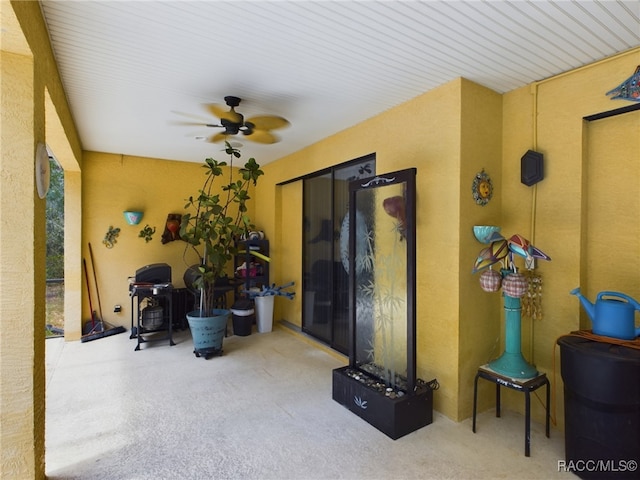 view of patio / terrace with ceiling fan