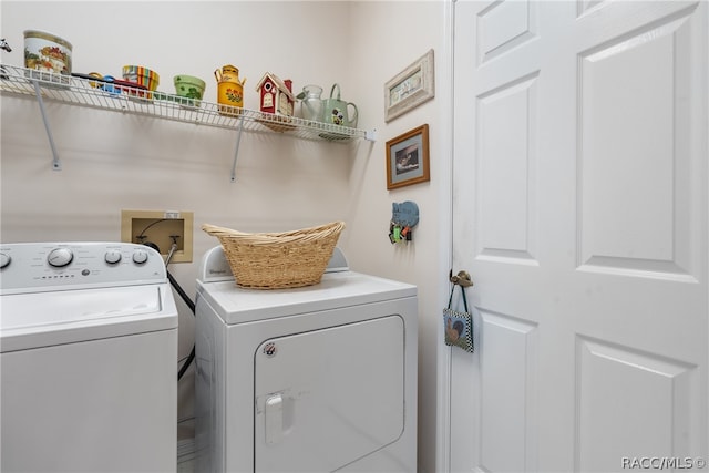 laundry area featuring washer and clothes dryer