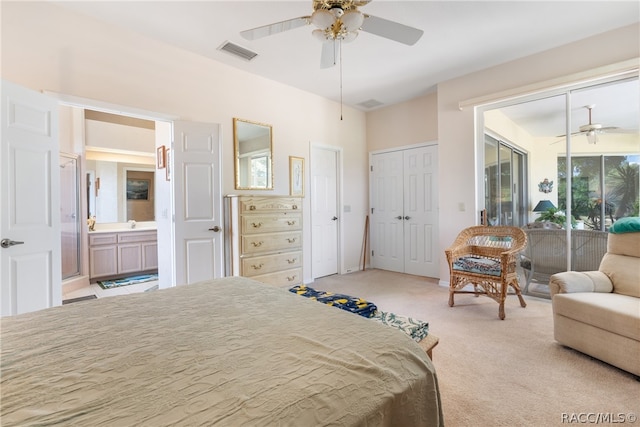 bedroom with light carpet, access to outside, ensuite bath, and ceiling fan