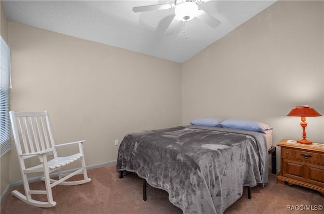 carpeted bedroom featuring ceiling fan and vaulted ceiling