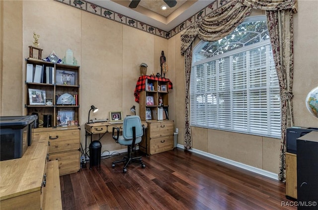 office featuring baseboards, a ceiling fan, and wood finished floors