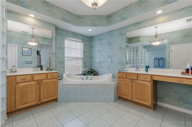 bathroom with tile patterned flooring, a garden tub, and wallpapered walls