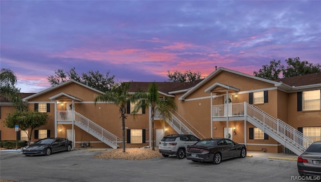 view of outdoor building at dusk